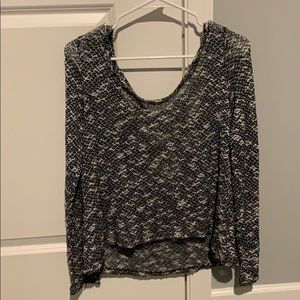 Black and white open back sweater.